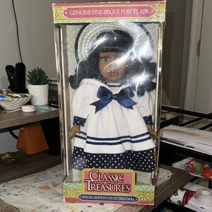 Porcelain Doll with Blue and White Dress